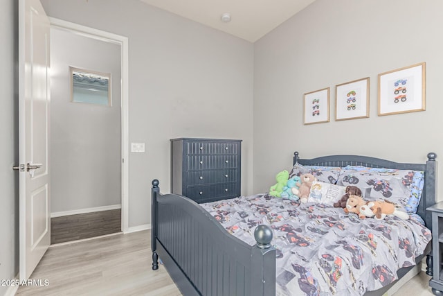 3884 S Wilson Dr, Chandler, AZ 85286 - bedroom featuring wood finished floors and baseboards
