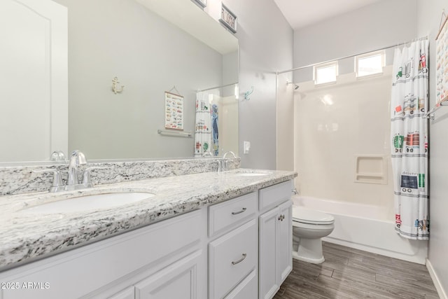 3884 S Wilson Dr, Chandler, AZ 85286 - full bathroom with double vanity, shower / bath combination with curtain, and wood finished floors