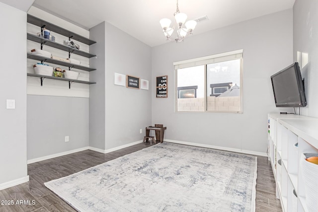 3884 S Wilson Dr, Chandler, AZ 85286 - living area featuring a chandelier and dark wood finished floors