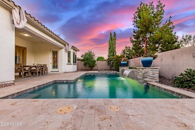 3884 S Wilson Dr, Chandler, AZ 85286 - pool at dusk featuring a patio area and a fenced backyard