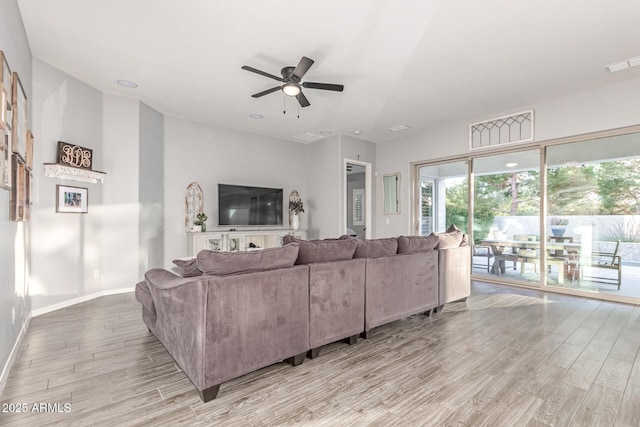 3884 S Wilson Dr, Chandler, AZ 85286 - living area featuring light wood-type flooring and a ceiling fan