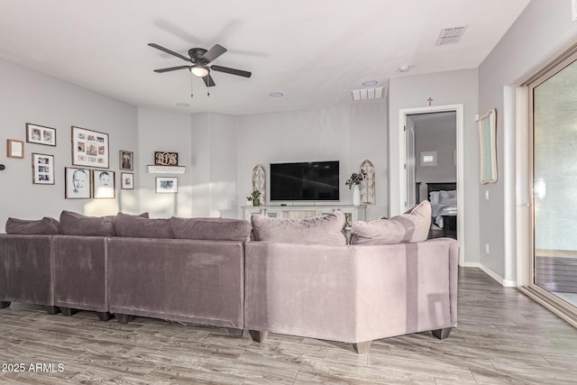 3884 S Wilson Dr, Chandler, AZ 85286 - living area featuring ceiling fan and wood finished floors