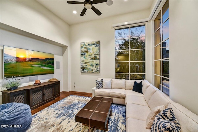 living room with ceiling fan, wood finished floors, and recessed lighting