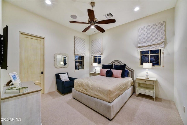 carpeted bedroom featuring visible vents, recessed lighting, and ceiling fan