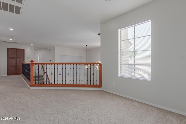 empty room with light carpet