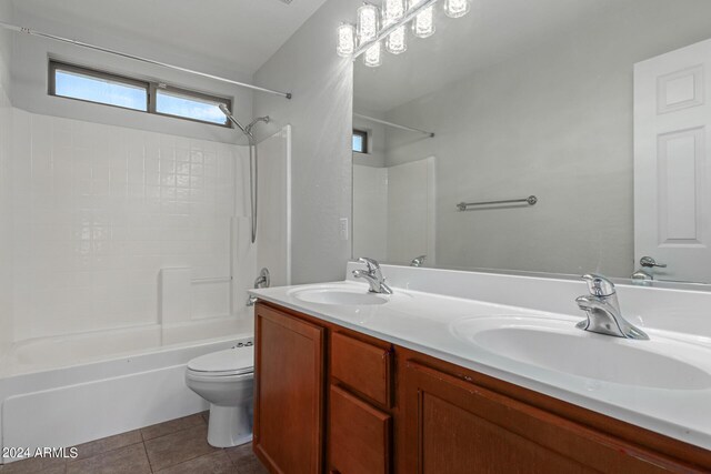 washroom featuring gas dryer hookup, washer hookup, cabinets, hookup for an electric dryer, and light tile patterned floors