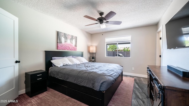 2139 W Obispo Ave, Mesa, AZ 85202 - bedroom featuring a textured ceiling, baseboards, and a ceiling fan