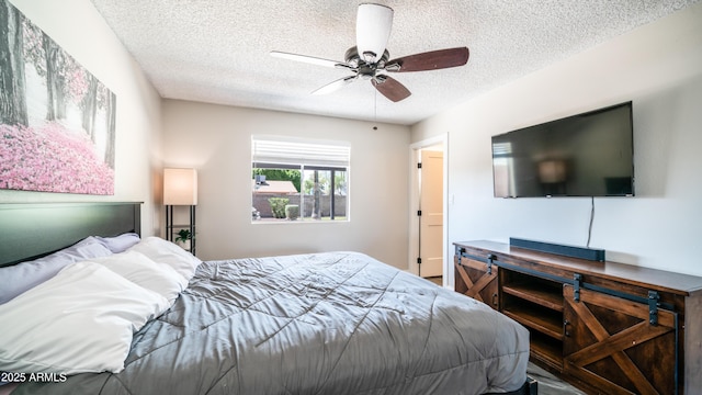 2139 W Obispo Ave, Mesa, AZ 85202 - bedroom with a textured ceiling and a ceiling fan