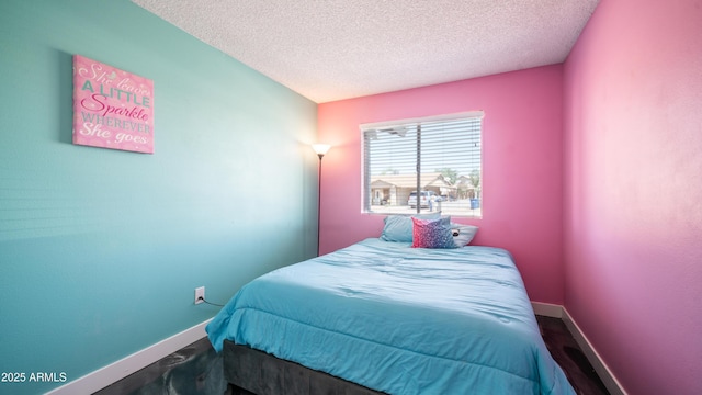 2139 W Obispo Ave, Mesa, AZ 85202 - bedroom featuring a textured ceiling and baseboards