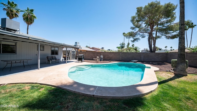 2139 W Obispo Ave, Mesa, AZ 85202 - view of swimming pool with central air condition unit, a patio, a fenced backyard, and area for grilling