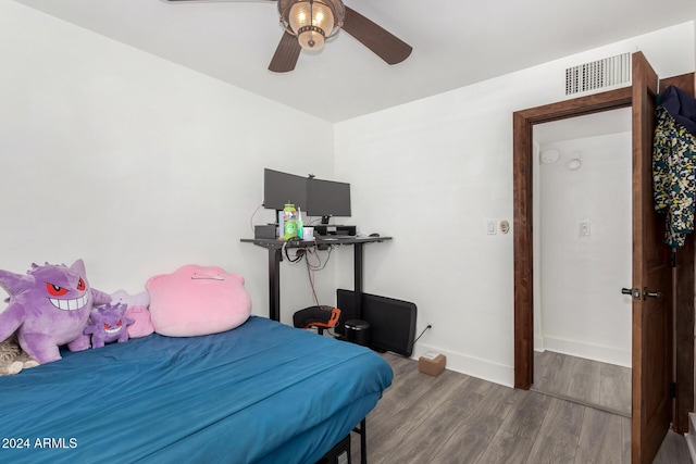 bedroom featuring wood-type flooring and ceiling fan