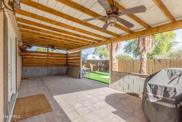 view of patio featuring area for grilling and ceiling fan