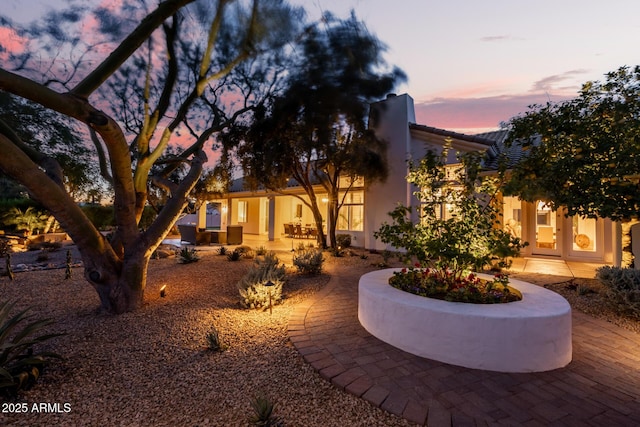 view of front of property with a patio area