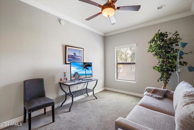 sitting room with crown molding, carpet, and baseboards