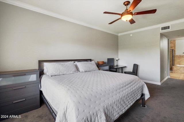 carpeted bedroom featuring visible vents, baseboards, ornamental molding, and a ceiling fan