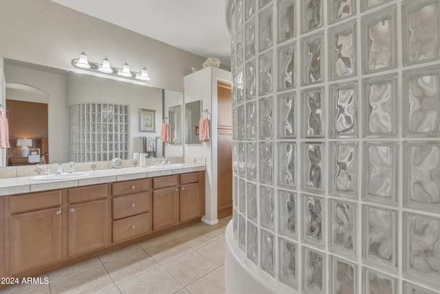 bathroom with vanity and tile patterned floors