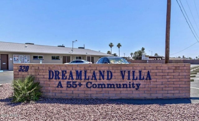 view of community sign