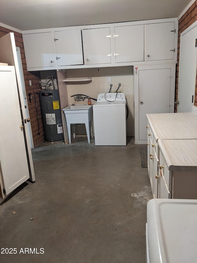 laundry area with washer hookup, electric water heater, sink, and cabinets