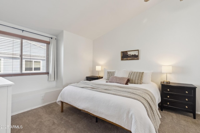 carpeted bedroom featuring baseboards