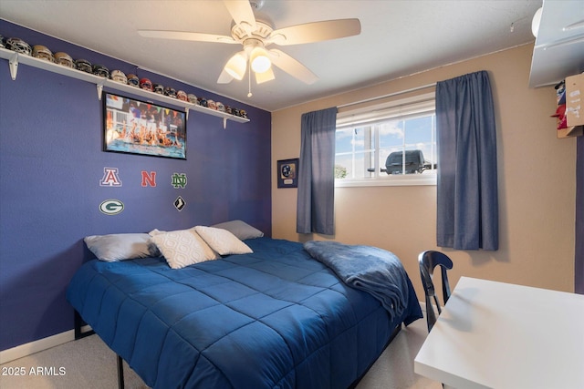 carpeted bedroom featuring ceiling fan