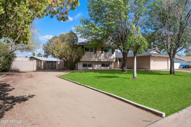split level home with concrete driveway, a gate, stucco siding, and a garage