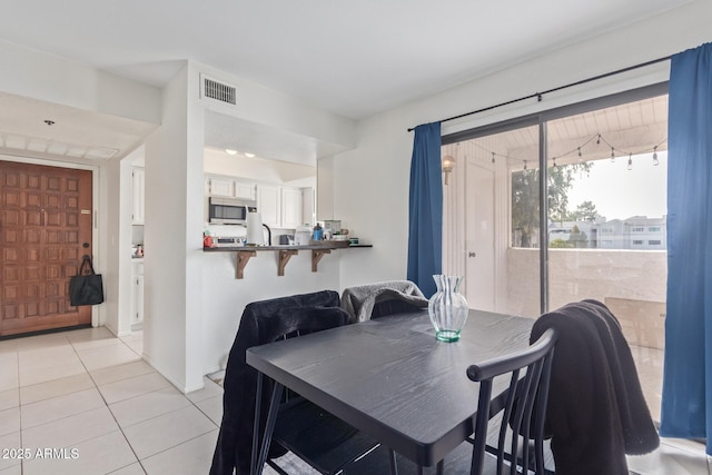 view of tiled dining area