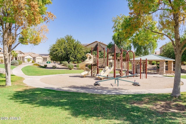 community jungle gym with a yard