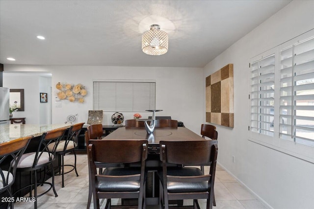 view of tiled dining space