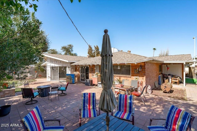 back of house featuring a patio