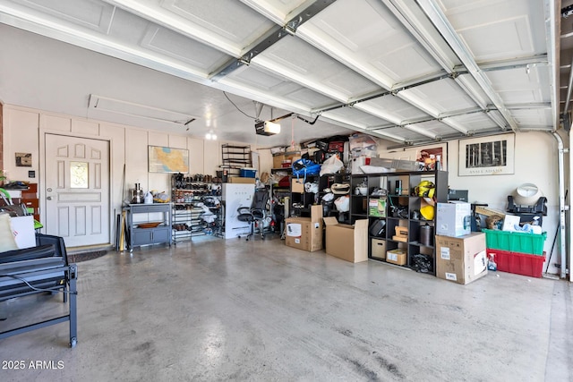 garage featuring a garage door opener