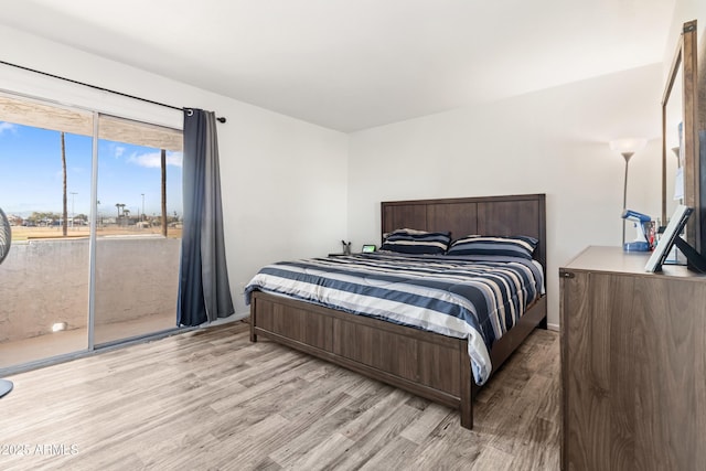 6345 N 49th Ave, Glendale, AZ 85301 - bedroom with access to outside and light wood finished floors