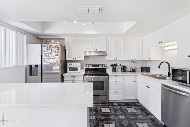 6345 N 49th Ave, Glendale, AZ 85301 - kitchen with stainless steel appliances, a sink, visible vents, white cabinetry, and light countertops