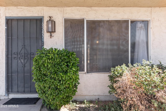 6345 N 49th Ave, Glendale, AZ 85301 - doorway to property featuring stucco siding