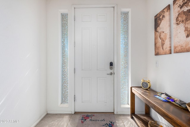 view of tiled foyer entrance