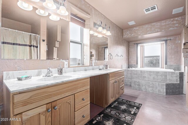 43911 N 13th Ave, New River, AZ 85087 - full bathroom with concrete floors and double vanity