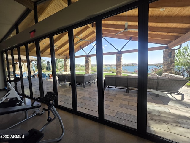 doorway to outside featuring wooden ceiling, vaulted ceiling with beams, and a sunroom