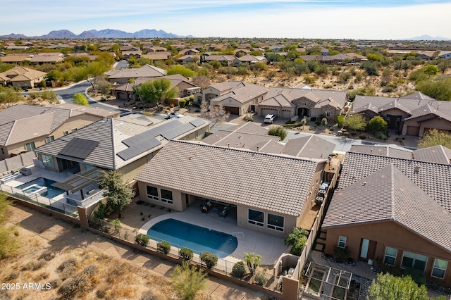 drone / aerial view with a residential view and a mountain view