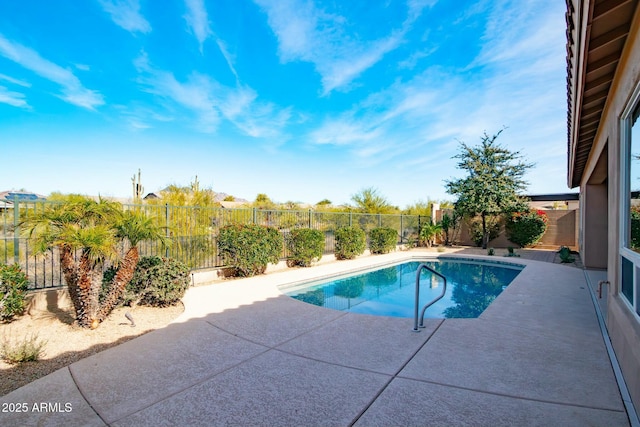 view of swimming pool with a patio area, a fenced backyard, and a fenced in pool