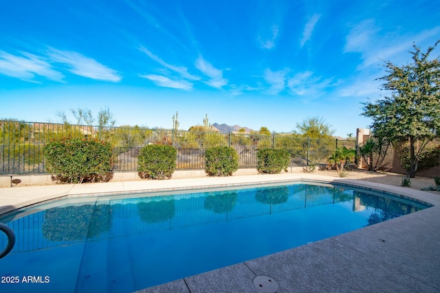 view of pool featuring a fenced backyard and a fenced in pool