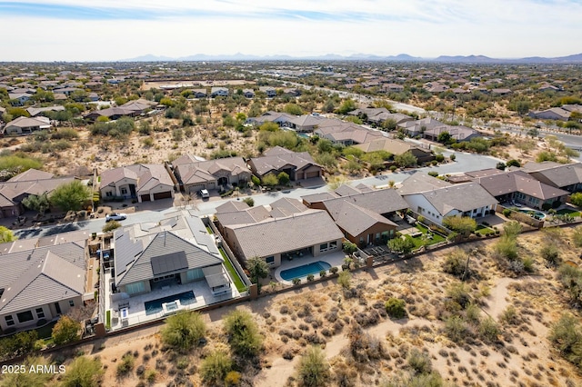 bird's eye view with a mountain view and a residential view