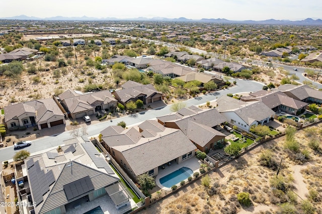 birds eye view of property featuring a residential view and a mountain view