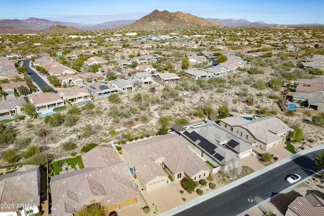 bird's eye view with a mountain view and a residential view