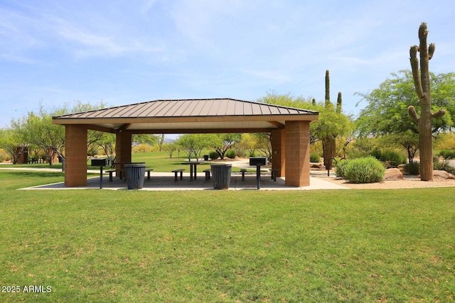 view of community featuring a lawn and a gazebo