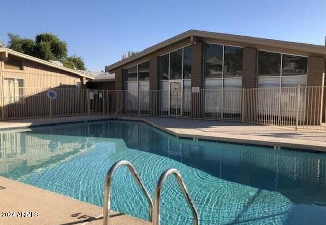 community pool with fence