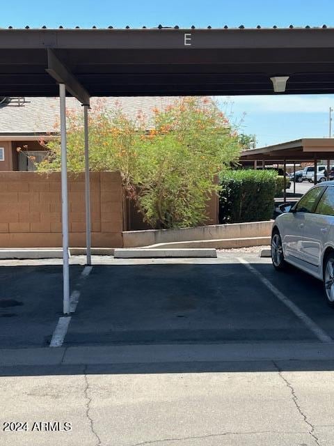 view of car parking with a carport