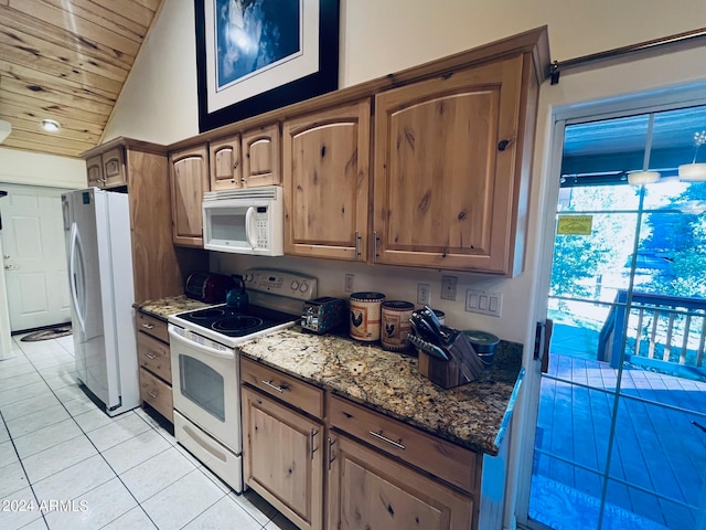 kitchen featuring lofted ceiling, wooden ceiling, light tile patterned flooring, white appliances, and stone countertops