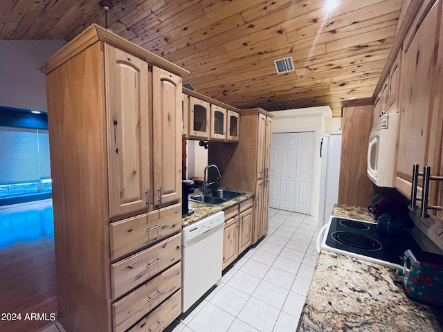 kitchen featuring visible vents, a sink, white appliances, light tile patterned floors, and wood ceiling