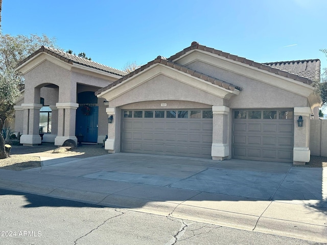 view of front of home with a garage