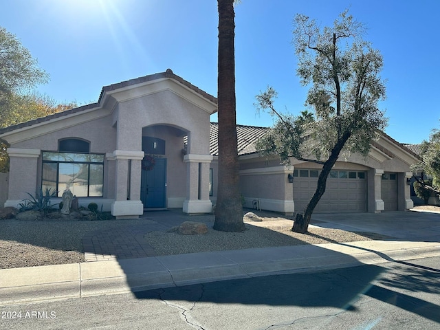 view of front of property featuring a garage