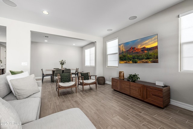 25725 S 230th St, Queen Creek, AZ 85142 - living room with recessed lighting, light wood-style floors, and baseboards